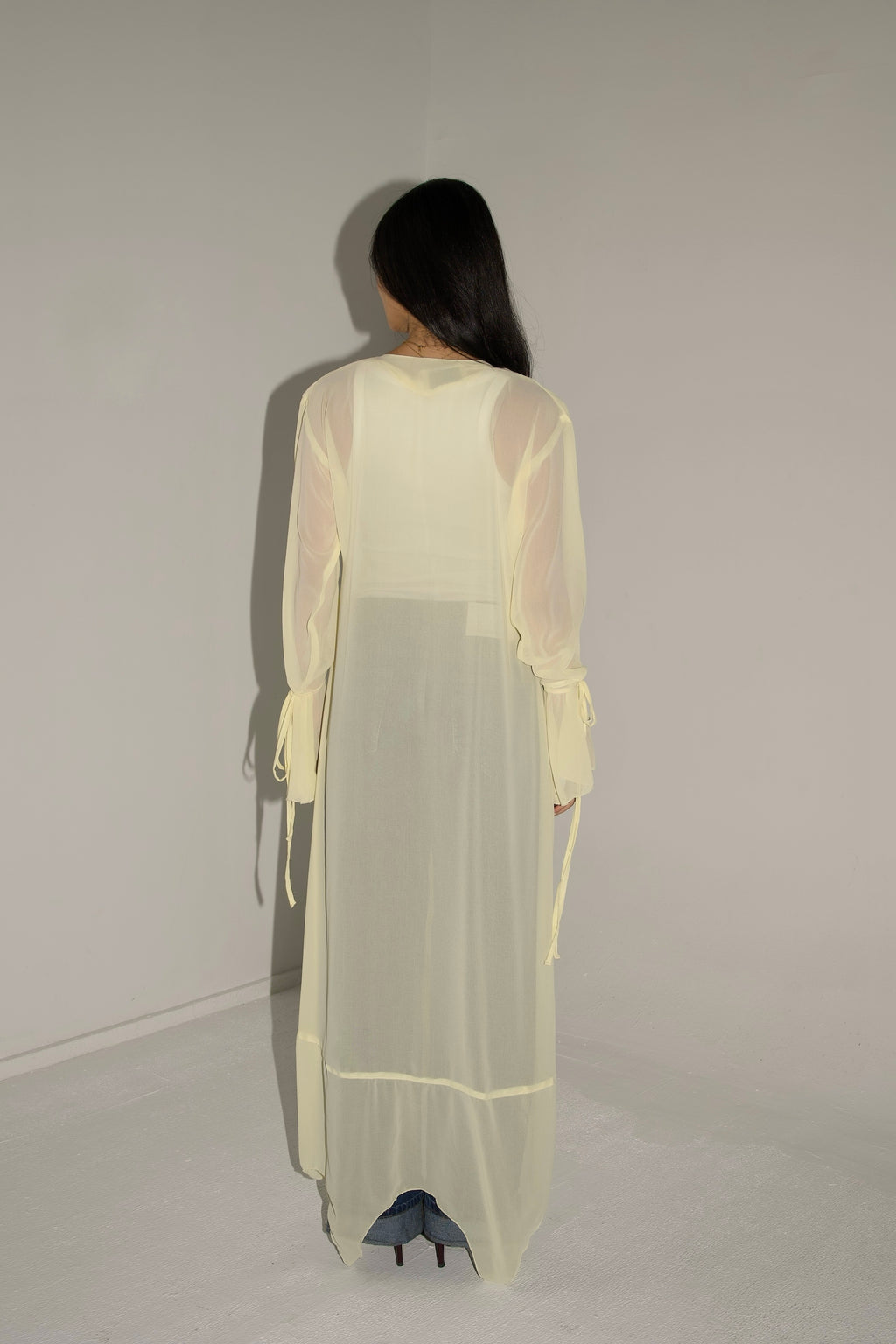 Ruffles cardigan in butter yellow