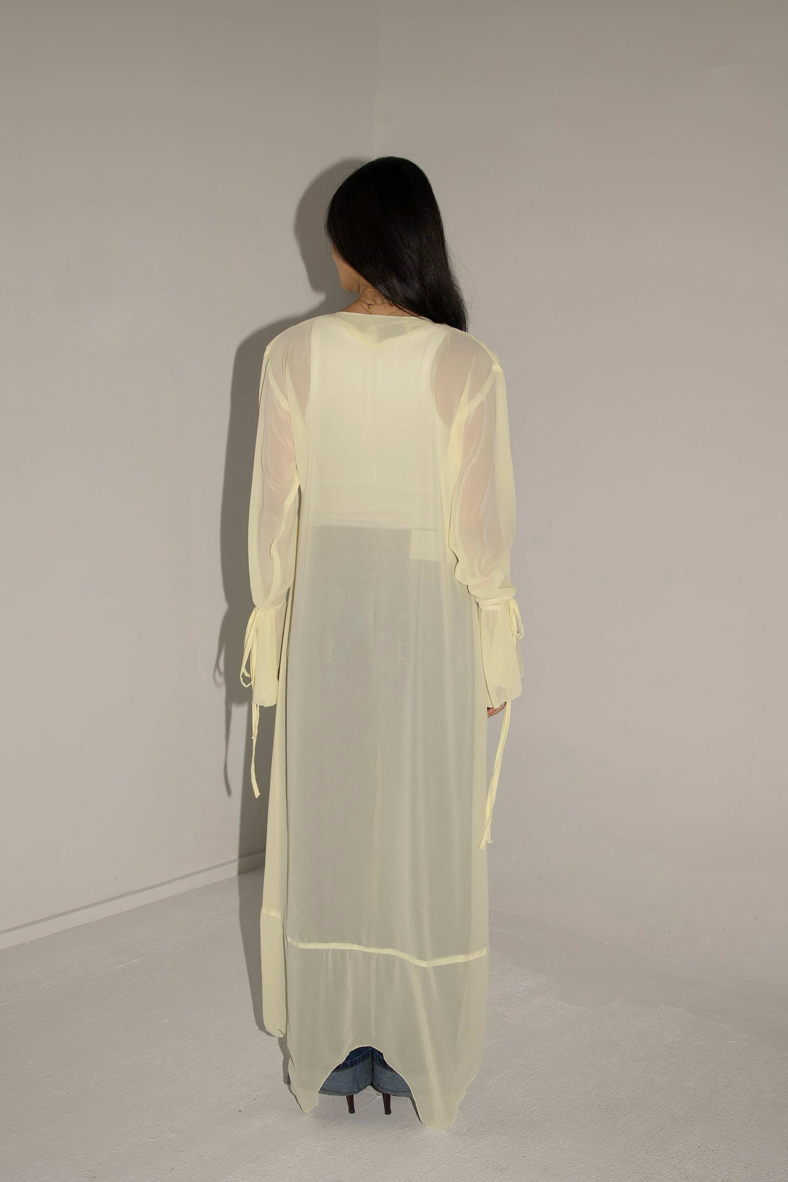 Ruffles cardigan in butter yellow