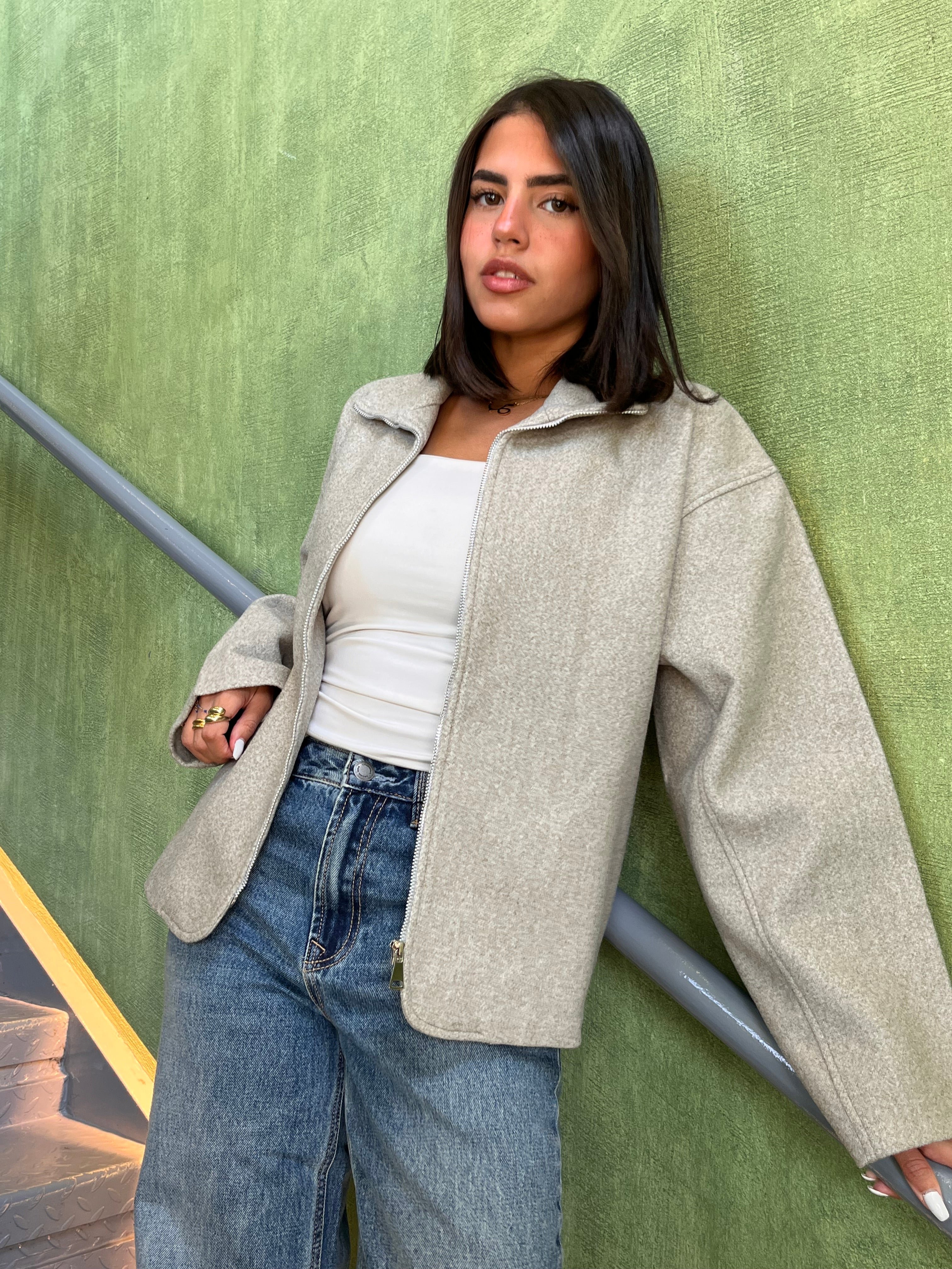 Short wool blend jacket with seams