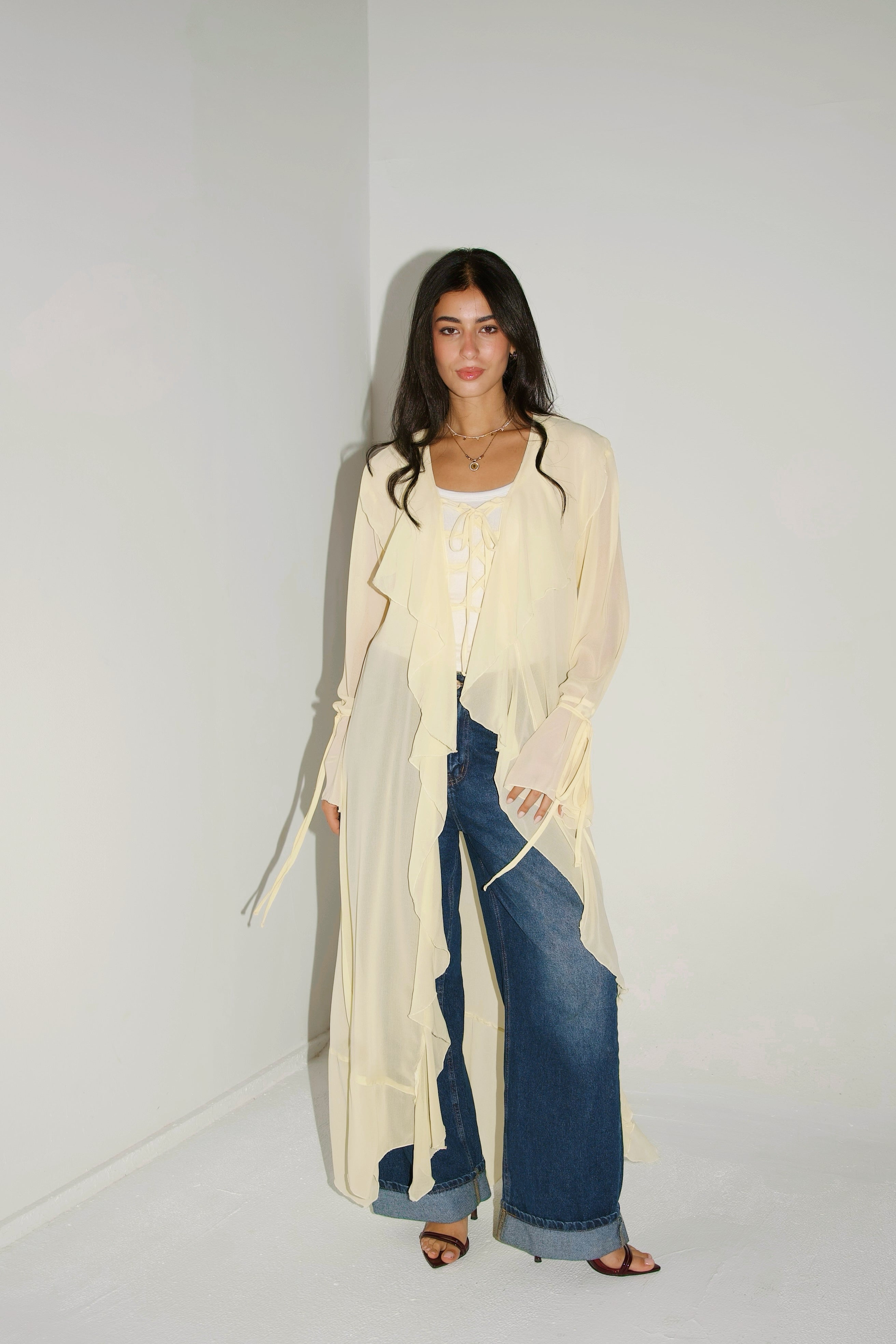 Ruffles cardigan in butter yellow