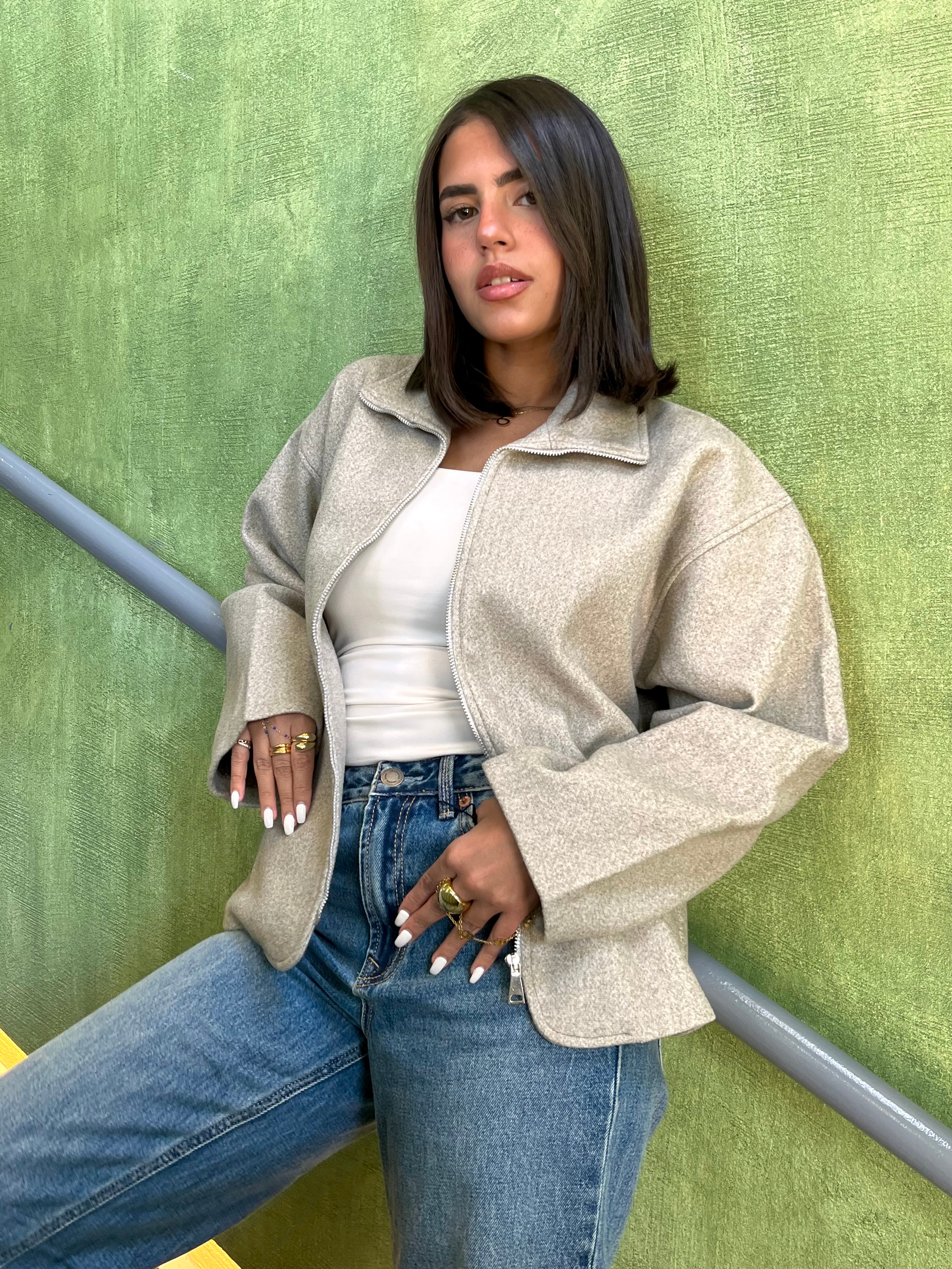 Short wool blend jacket with seams